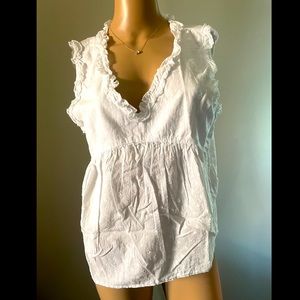 White sleeveless top